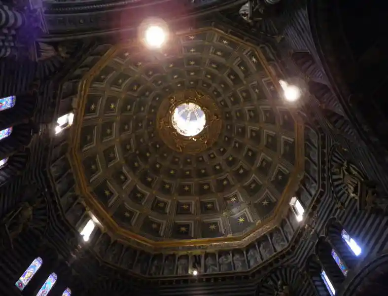 Stars in the form of a solar disc on the ceiling of Siena Cathedral